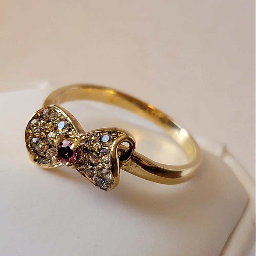 Vintage Bow Ring DAC Clear Diamond Like Stone Pave Center Pink Stone Gold Sz 9 ¼